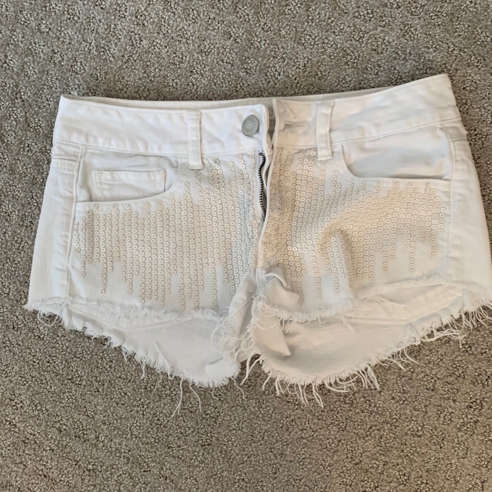 White Denim Shorts with Distressed Detail